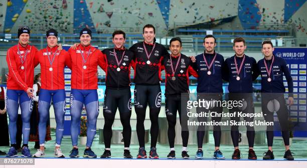 The team of Norway with Havard Holmefjord Lorentzen, Bjoern Magnussen and Henrik Rukke poses during the medal ceremony after winning the 2nd place,...