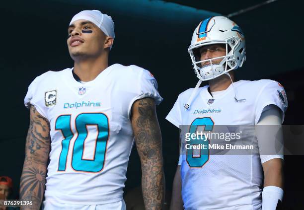 Jay Cutler and Kenny Stills of the Miami Dolphins before a game against the Tampa Bay Buccaneers at Hard Rock Stadium on November 19, 2017 in Miami...