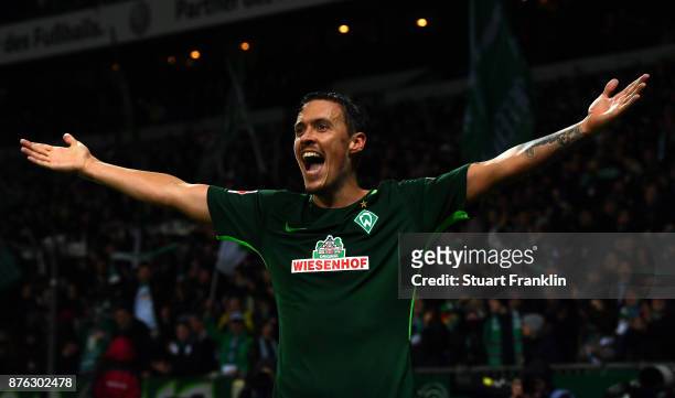 Max Kruse of Bremen celebrates scoring his third goal during the Bundesliga match between SV Werder Bremen and Hannover 96 at Weserstadion on...