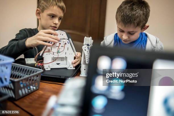 Young student testing produtc at New Robotics Center has opened in Kiev, Ukraine, on November 19, 2017.