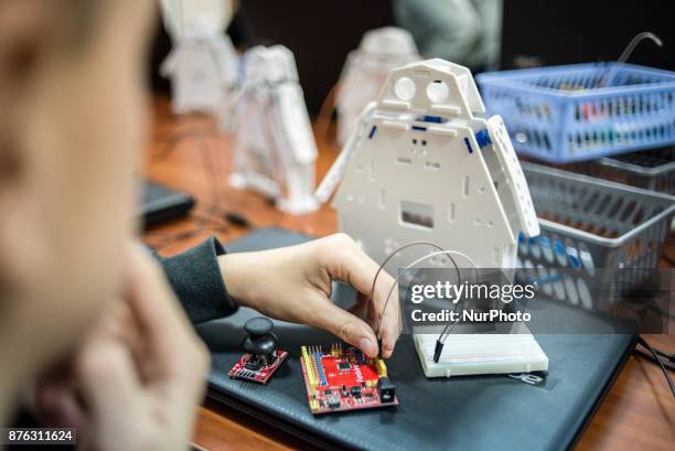 Young student testing produtc at New Robotics Center has opened in Kiev, Ukraine, on November 19, 2017.