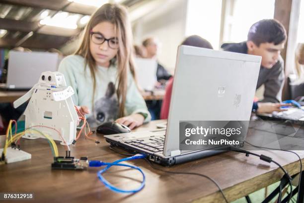 Young student testing produtc at New Robotics Center has opened in Kiev, Ukraine, on November 19, 2017.