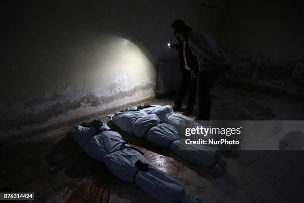 Image depicts graphic content) Martyrs of the bombing of the forces of the regime of the city of Douma mortar shells, where he rose seven martyrs and...