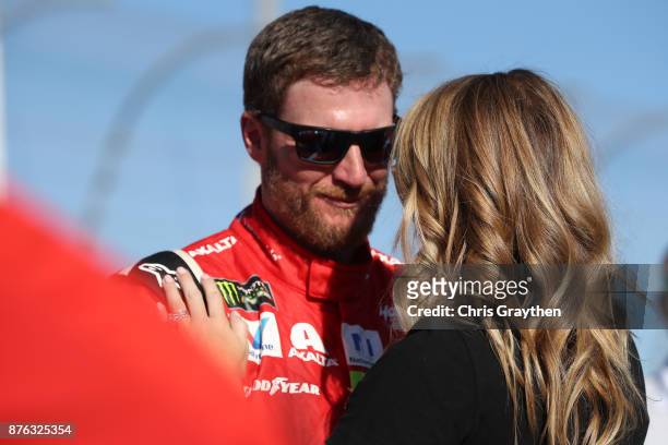 Dale Earnhardt Jr., driver of the AXALTA Chevrolet, and his wife Amy during pre-race ceremonies for the Monster Energy NASCAR Cup Series Championship...