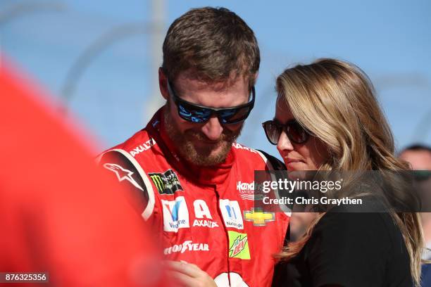 Dale Earnhardt Jr., driver of the AXALTA Chevrolet, and his wife Amy during pre-race ceremonies for the Monster Energy NASCAR Cup Series Championship...