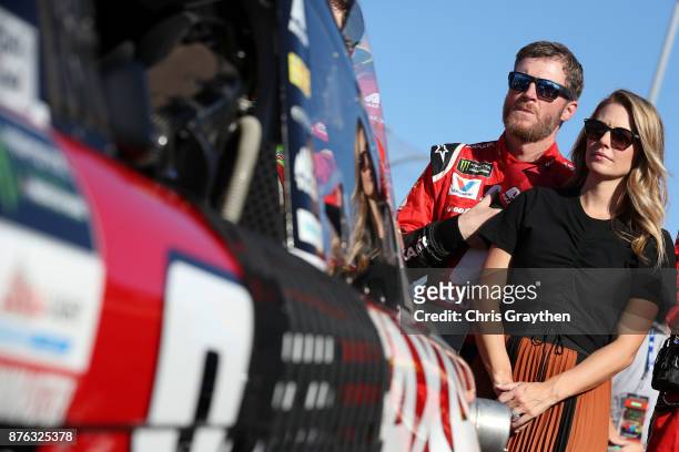 Dale Earnhardt Jr., driver of the AXALTA Chevrolet, and his wife Amy during pre-race ceremonies for the Monster Energy NASCAR Cup Series Championship...