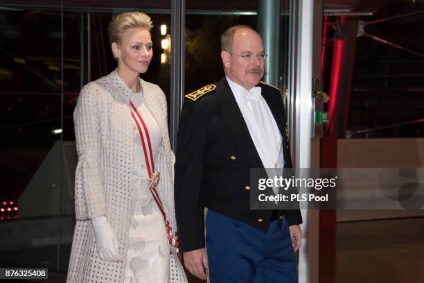 Princess Charlene of Monaco and Prince Albert II of Monaco arrive at the Monaco National Day Gala in Grimaldi Forum on November 19, 2017 in Monaco,...