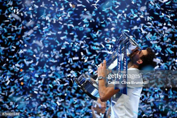 Grigor Dimitrov of Bulgaria kisses the trophy as he celebrates victory during the singles final against David Goffin of Belgium during day eight of...