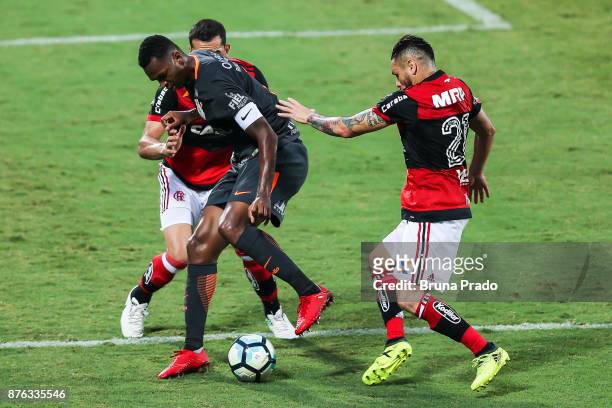 Jo of Corinthians struggles for the ball with a Rhodolfo and Para of Flamengo during the Brasileirao Series A 2017 match between Flamengo and...