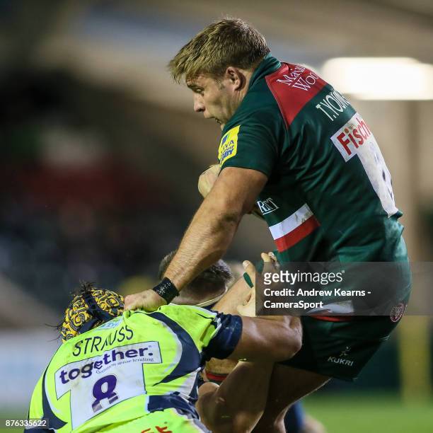 Leicester Tigers' Tom Youngs grapples with Sale Sharks' Josh Strauss during the Aviva Premiership match between Leicester Tigers and Sale Sharks at...