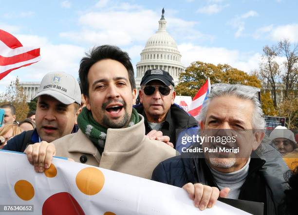Lin-Manuel Miranda and his father, Luis A. Miranda Jr. , attend a Unity for Puerto Rico march on Capitol Hill on November 19, 2017 in Washington, DC.