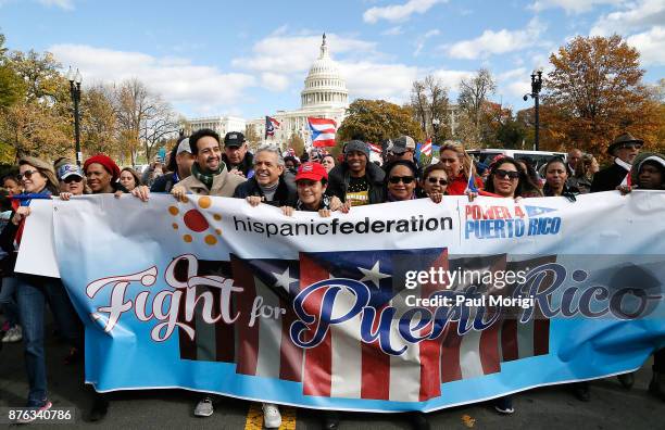 Lin-Manuel Miranda and Luis A. Miranda, Jr. Attend a Unity March For Puerto Rico on Capitol Hill on November 19, 2017 in Washington, DC.