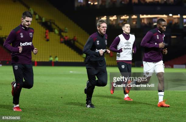 Stuart Pearce assistant manager of West Ham United warms down with the players after the Premier League match between Watford and West Ham United at...