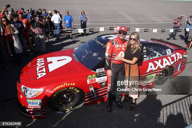 Dale Earnhardt Jr., driver of the AXALTA Chevrolet, and Amy Earnhardt pose for a photo prior to the Monster Energy NASCAR Cup Series Championship...