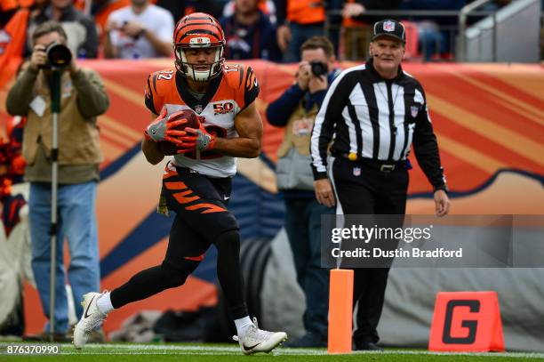 Wide receiver Alex Erickson of the Cincinnati Bengals crosses the goal line for a 29 yard second quarter touchdown against the Denver Broncos at...