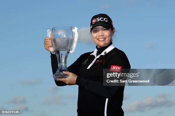 Ariya Jutanugarn of Thailand poses with the CME Group Tour Championship trophy after the final round of the CME Group Tour Championship at the...