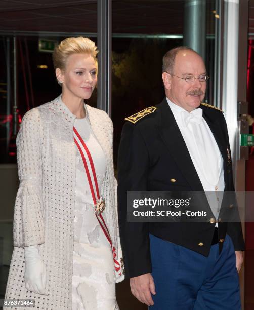 Princess Charlene of Monaco and Prince Albert II of Monaco arrive at the Monaco National Day Gala in Grimaldi Forum on November 19, 2017 in Monaco,...