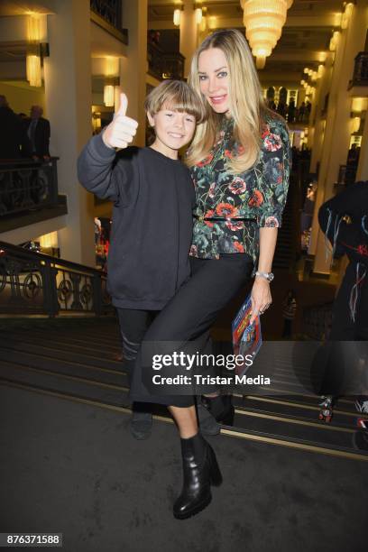 Xenia Seeberg and her son Philip-Elias Martinek attend the premiere of the children's show 'Spiel mit der Zeit' at Friedrichstadtpalast on November...