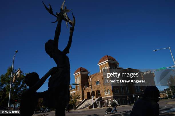 View of the 'Four Spirits' statue and the 16th Street Baptist Church, November 19, 2017 in Birmingham, Alabama. The statues memorialize the four...