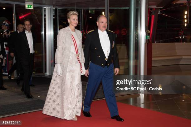 Princess Charlene of Monaco and Prince Albert II of Monaco arrive at the Monaco National Day Gala in Grimaldi Forum on November 19, 2017 in Monaco,...