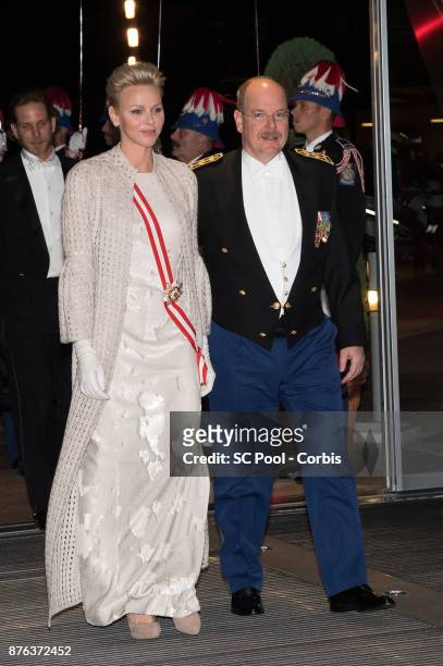 Princess Charlene of Monaco and Prince Albert II of Monaco arrive at the Monaco National Day Gala in Grimaldi Forum on November 19, 2017 in Monaco,...