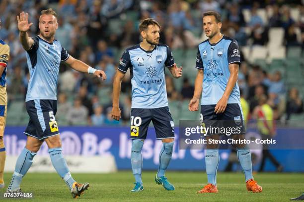 Milos Ninkovic and Deyvison Rogério da Silva, mostly known as Bobô of the Sydney FC during the round seven A-League match between Sydney FC and...