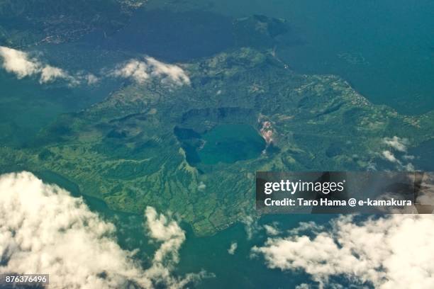 yellow lake in taal volcano island in province of batangas in philippines daytime aerial view from airplane - taal 個照片及圖片檔