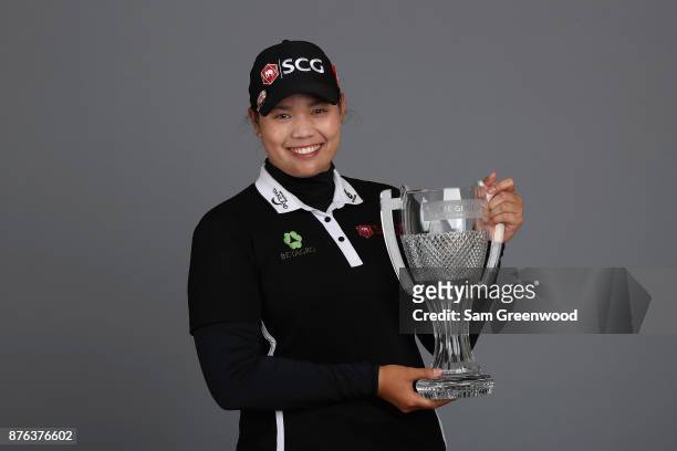 Ariya Jutanugarn of Thailand poses with the CME Group Tour Championship trophy after the final round of the CME Group Tour Championship at the...