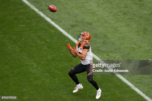 Wide receiver Alex Erickson of the Cincinnati Bengals catches a punt against the Denver Broncos in the first quarter of a game at Sports Authority...