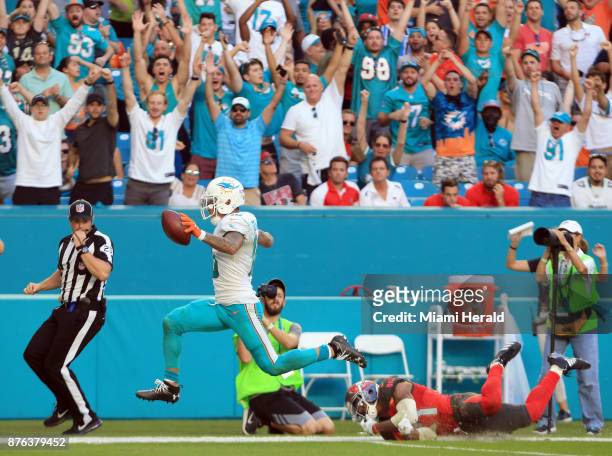 Miami Dolphins wide receiver Kenny Stills runs for a touchdown on a fourth quarter reception against the Tampa Bay Buccaneers on Sunday, Nov. 19,...