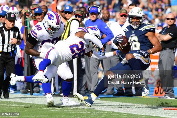 Tyrell Williams of the Los Angeles Chargers hit by E.J. Gaines of the Buffalo Bills during the first half of the game at StubHub Center on November...