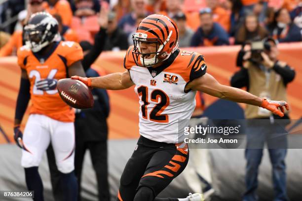 Alex Erickson of the Cincinnati Bengals celebrates a touchdown catch during the second quarter against the Denver Broncos. The Denver Broncos hosted...