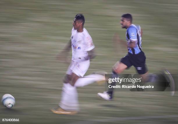 Bruno Henrique of Santos battles for the ball with Machado of Gremio during the match between Santos and Gremio as a part of Campeonato Brasileiro...