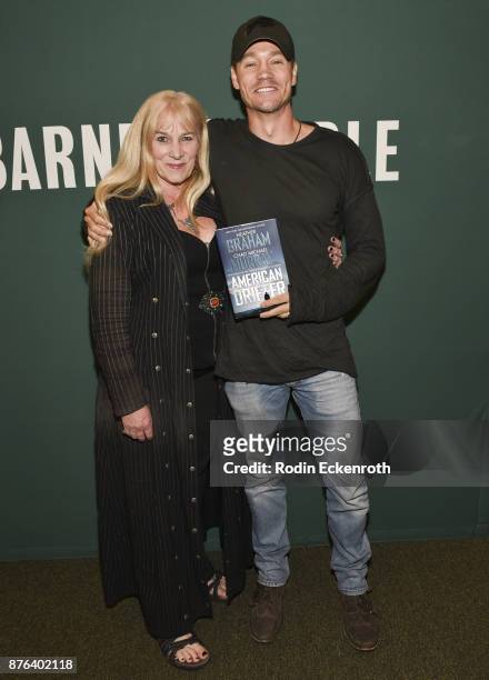 Author Heather Graham and actor/author Chad Michael Murray pose for portrait at his book signing of "American Drifter" at Barnes & Noble at The Grove...