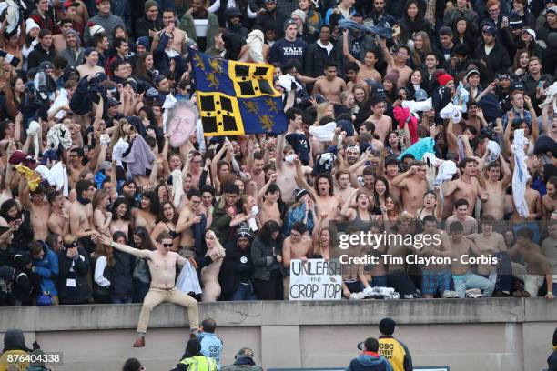 Yale fans remove their shirts during a third period ritual during the Yale V Harvard, Ivy League Football match at the Yale Bowl. Yale won the game...