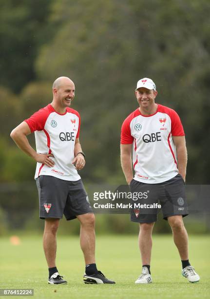 Swans assistant coaches Steve Johnson and Tadhg Kennelly talk during a Sydney Swans AFL pre-season training session at Sydney Grammar on November 20,...