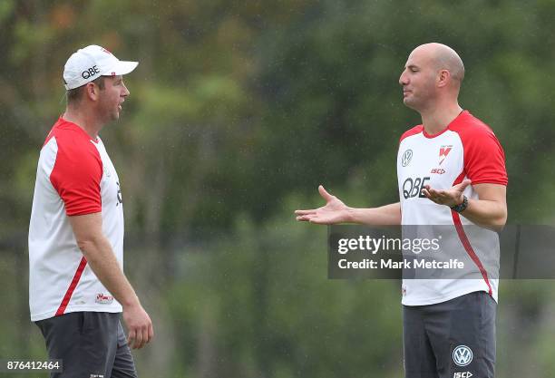 Swans assistant coaches Steve Johnson and Tadhg Kennelly talk during a Sydney Swans AFL pre-season training session at Sydney Grammar on November 20,...