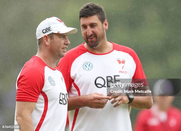 Swans assistant coaches Steve Johnson and Dean Cox talk during a Sydney Swans AFL pre-season training session at Sydney Grammar on November 20, 2017...