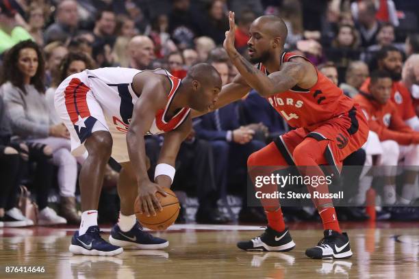 Toronto Raptors guard Lorenzo Brown defends against Washington Wizards guard Jodie Meeks as the Toronto Raptors play the Washington Wizards at the...