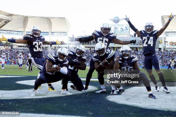 The Los Angeles Chargers defense celebrate after an interception during the NFL game against the Buffalo Bills at the StubHub Center on November 19,...