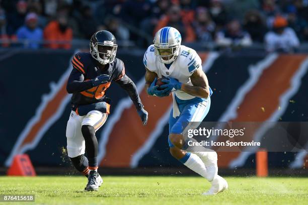 Detroit Lions wide receiver Kenny Golladay runs with the football past Chicago Bears cornerback Prince Amukamara during an NFL football game between...