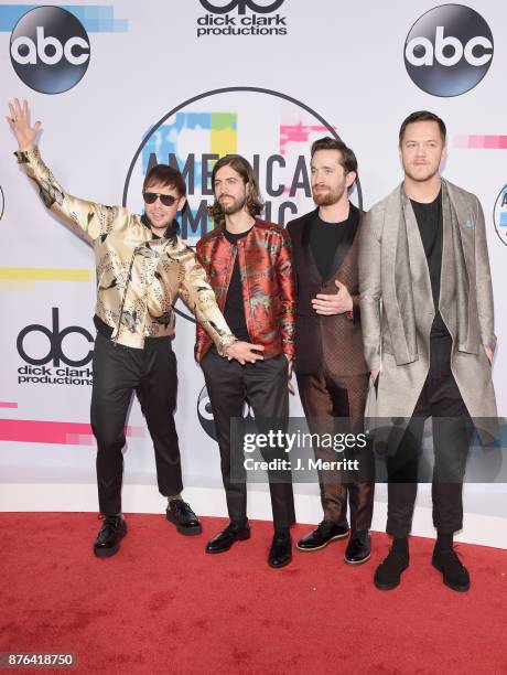 Ben McKee, Daniel Wayne Sermon, Daniel Platzman and Dan Reynolds of Imagine Dragons attends 2017 American Music Awards at Microsoft Theater on...