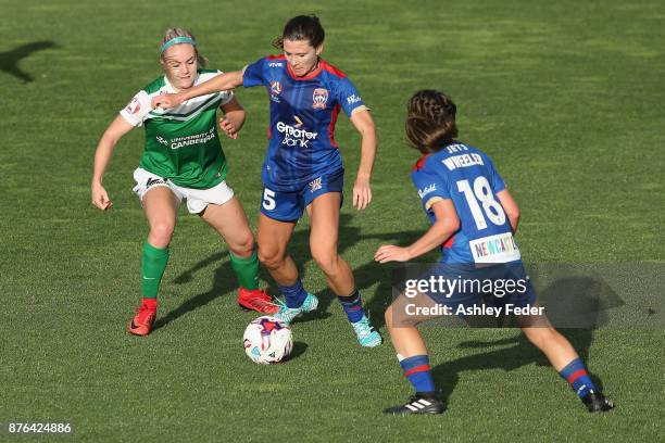 Arin Gilliland of the Jets contests the ball against Ellie Carpenter of Canberra United during the round four W-League match between Newcastle and...