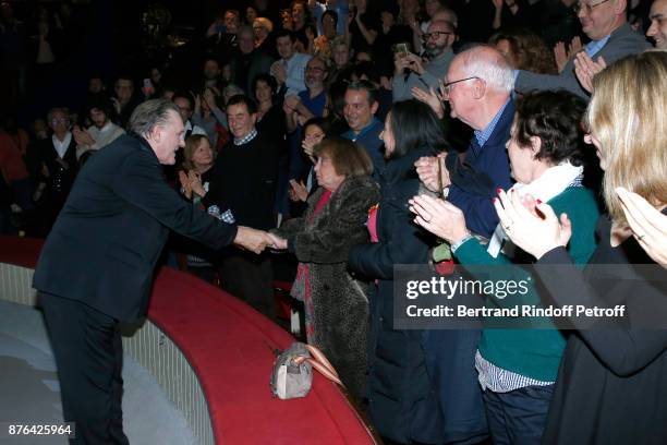 Gerard Depardieu acknowledges the applause of the audience and gives flowers at the end of Barbara makes Gerard Depardieu triumph in "Depardieu...