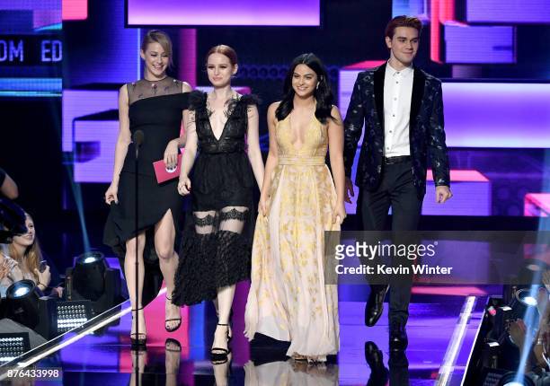 Lili Reinhart, Madelaine Petsch, Camila Mendes, and KJ Apa walk onstage during the 2017 American Music Awards at Microsoft Theater on November 19,...