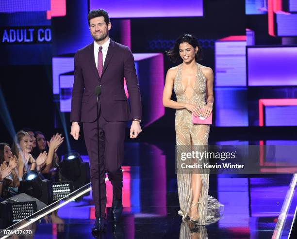 Billy Eichner and Jenna Dewan-Tatum walk onstage during the 2017 American Music Awards at Microsoft Theater on November 19, 2017 in Los Angeles,...