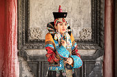 Young woman in a traditional Mongolian outfit.