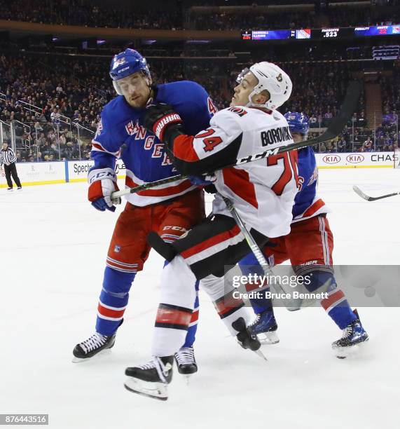 Brendan Smith of the New York Rangers takes a five minute major and a game misconduct for his interference on Mark Borowiecki of the Ottawa Senators...