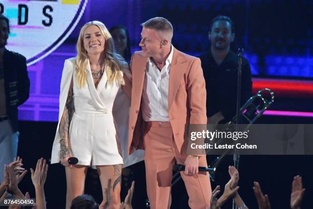 Skylar Grey and Macklemore perform onstage during the 2017 American Music Awards at Microsoft Theater on November 19, 2017 in Los Angeles, California.