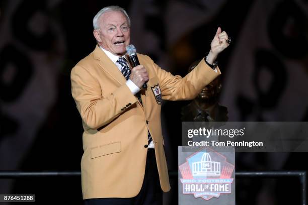 Dallas Cowboys owner Jerry Jones reacts after receiving his Pro Football Hall of Fame ring during halftime at AT&T Stadium on November 19, 2017 in...